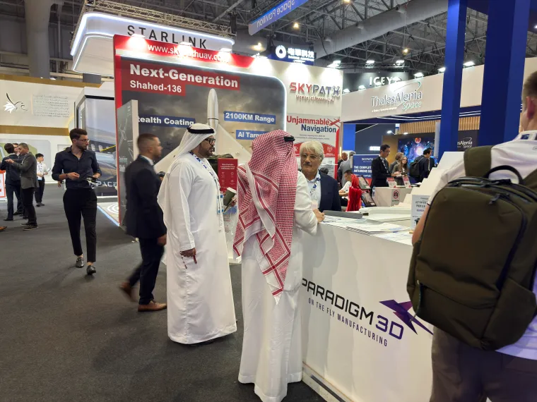 Visitors at the Paradigm 3D branded counter at Dubai Airshow 2025