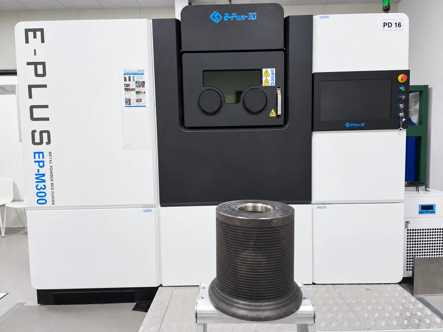 Metal-printed cage in front of the Eplus3D EP-M300