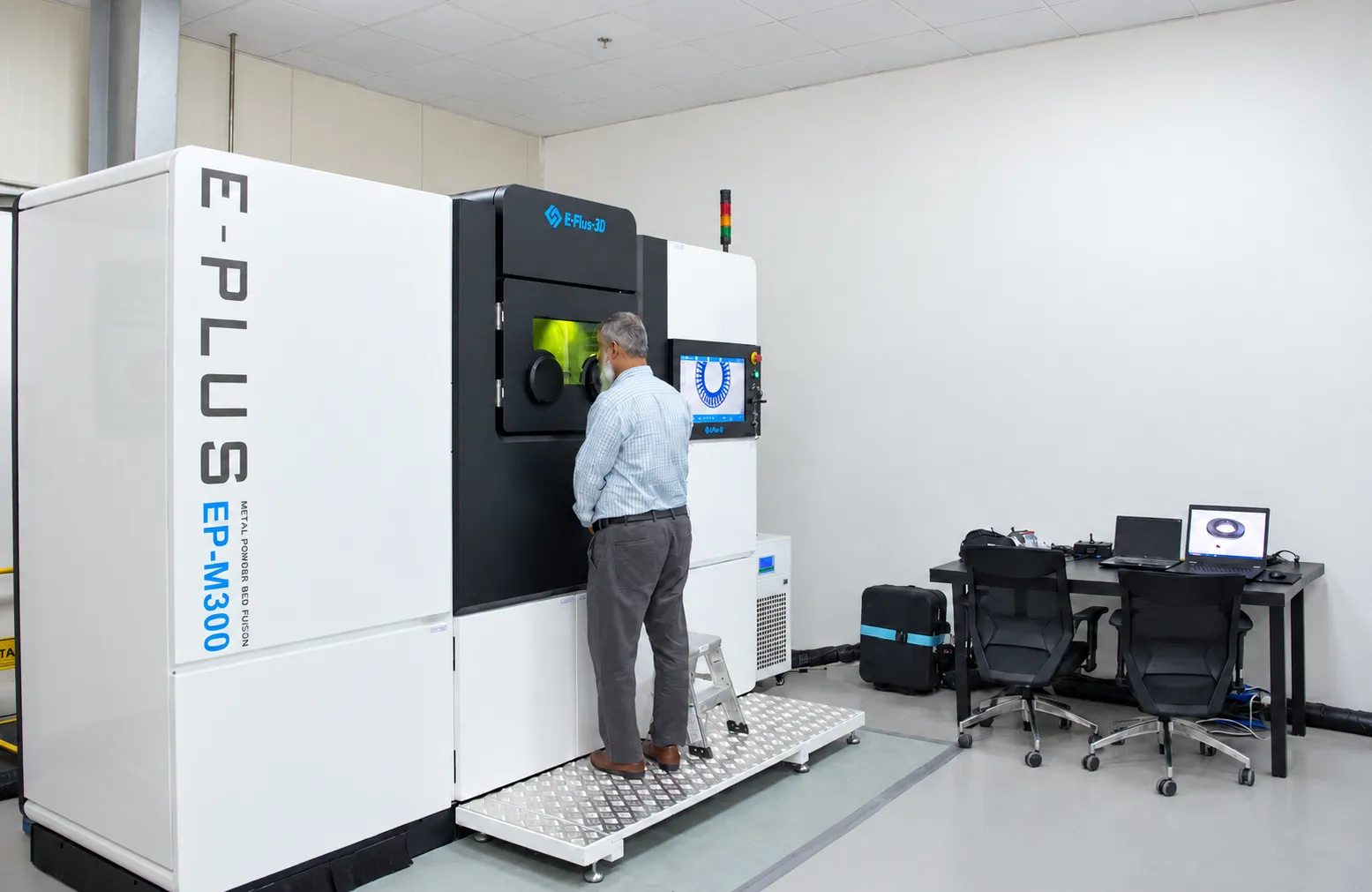 Operator at the Eplus3D EP-M300 metal printer