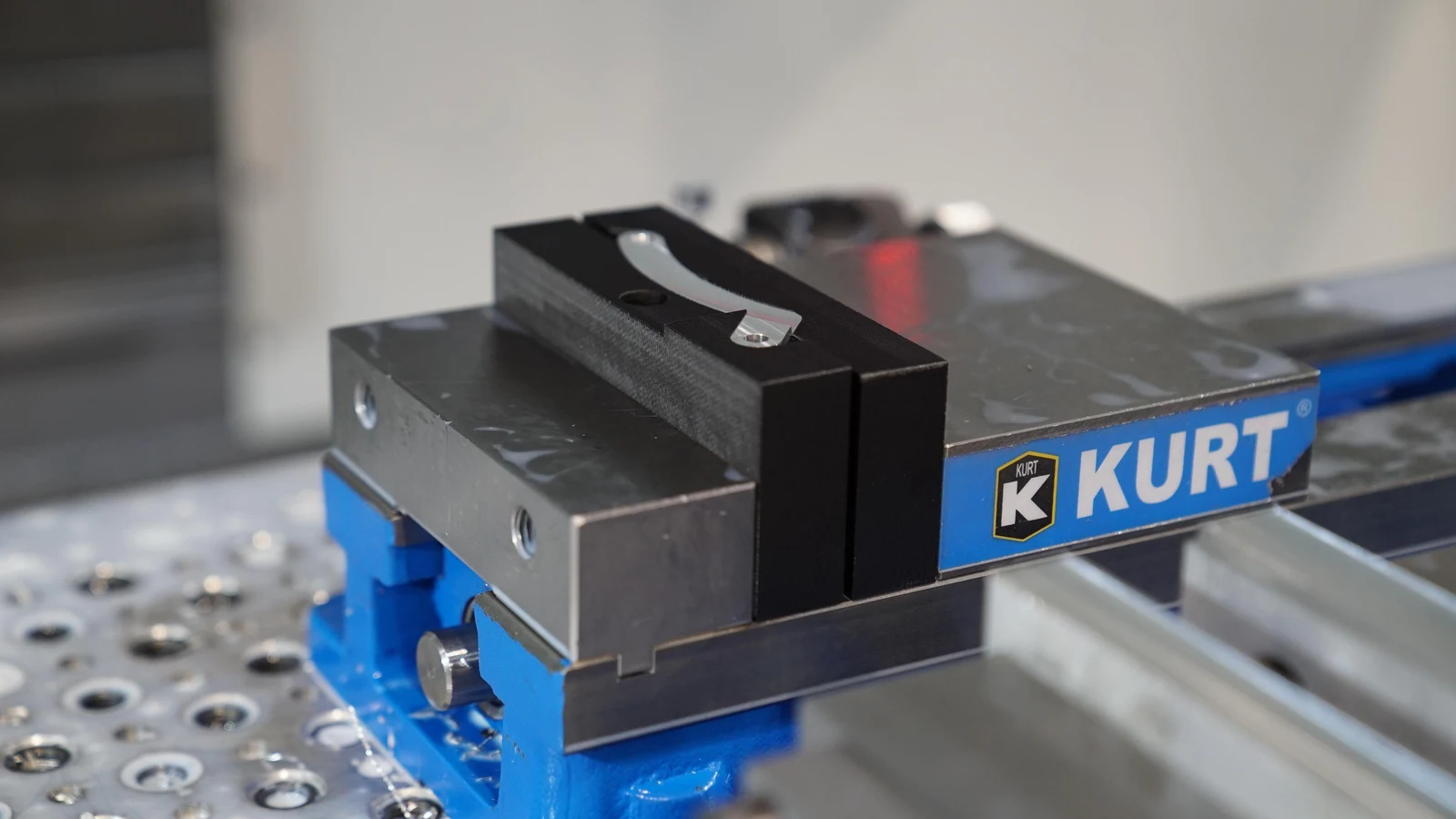 Nylon 12CF soft jaws holding a metal component in a machine vice