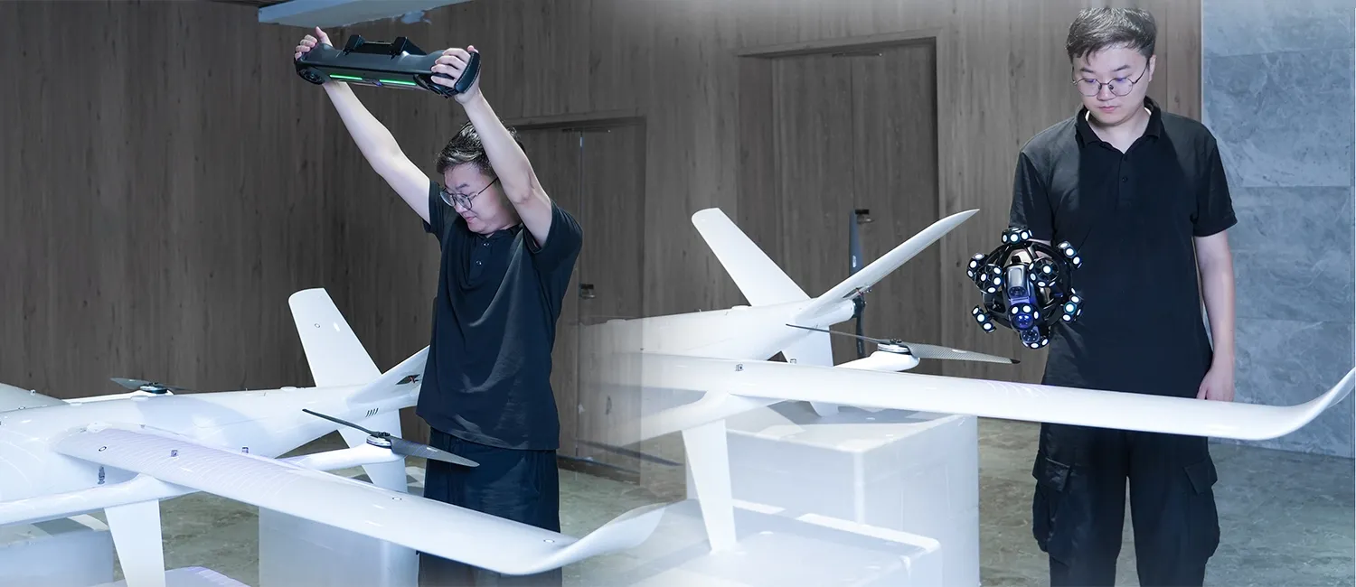 Operators scanning a large model with the wireless NimbleTrack system