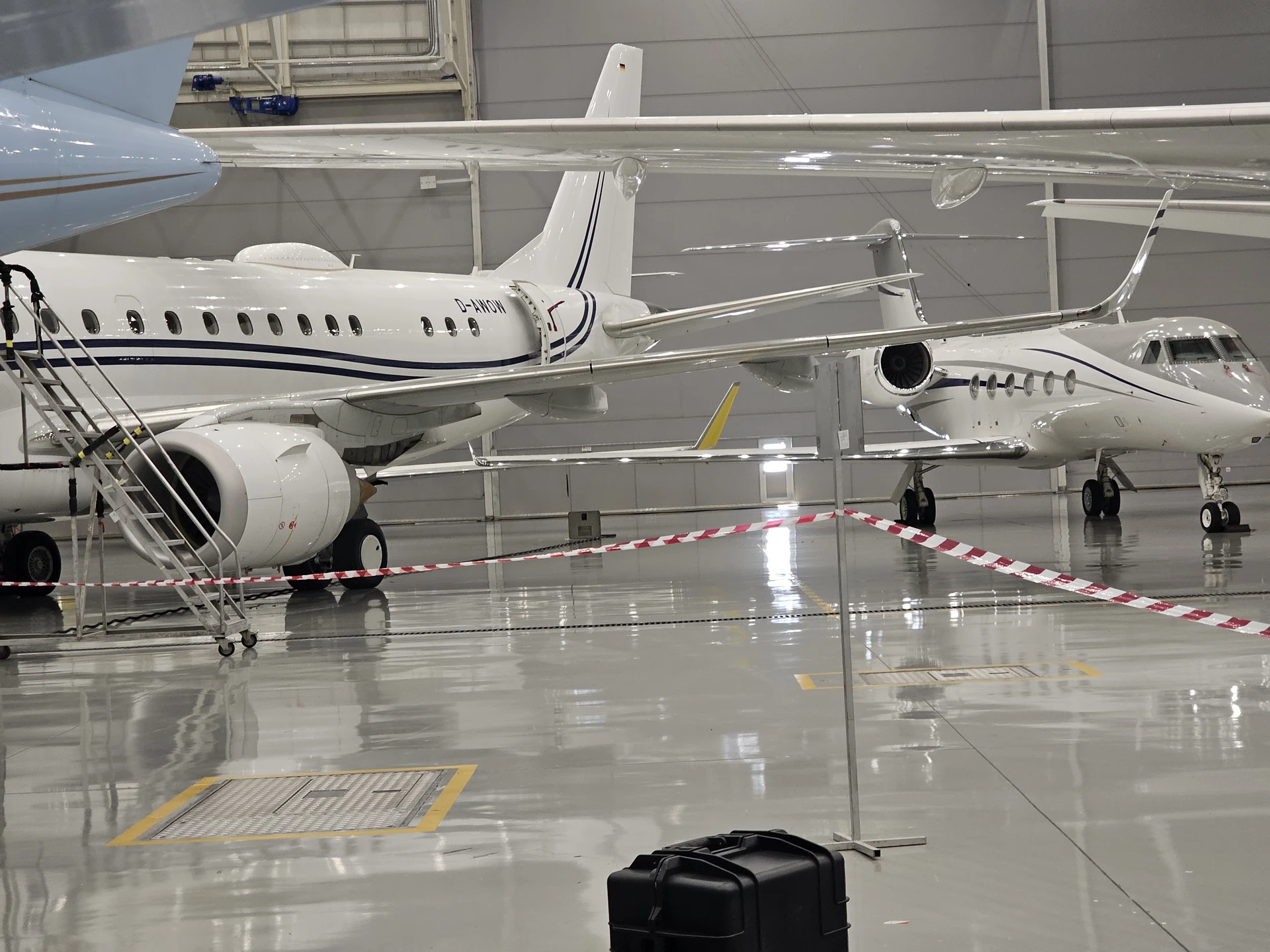 Business aircraft inside a hangar during an on-site visit