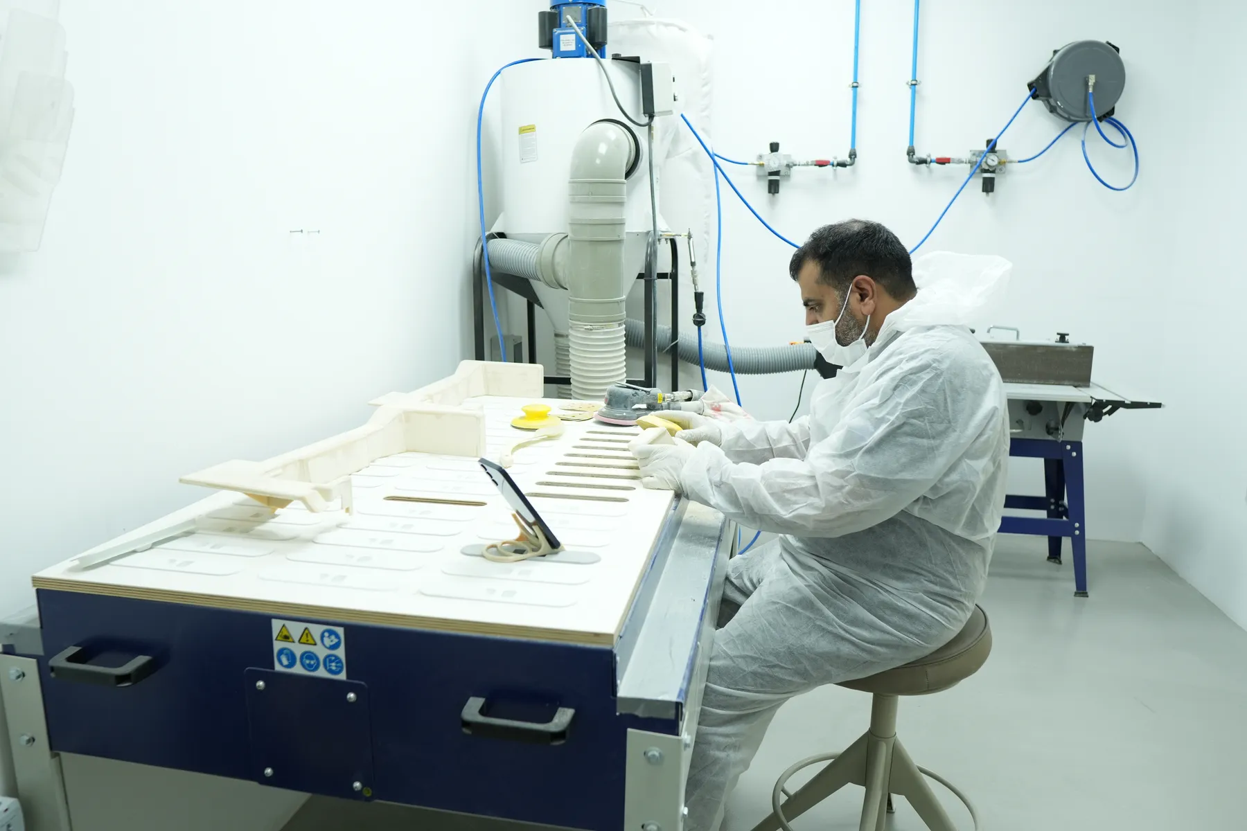 Printed polymer components being prepared on the Paradigm 3D finishing bench