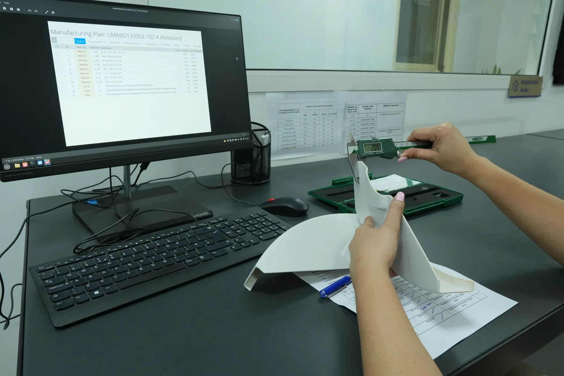 Paradigm 3D inspector checking a printed part against its inspection record