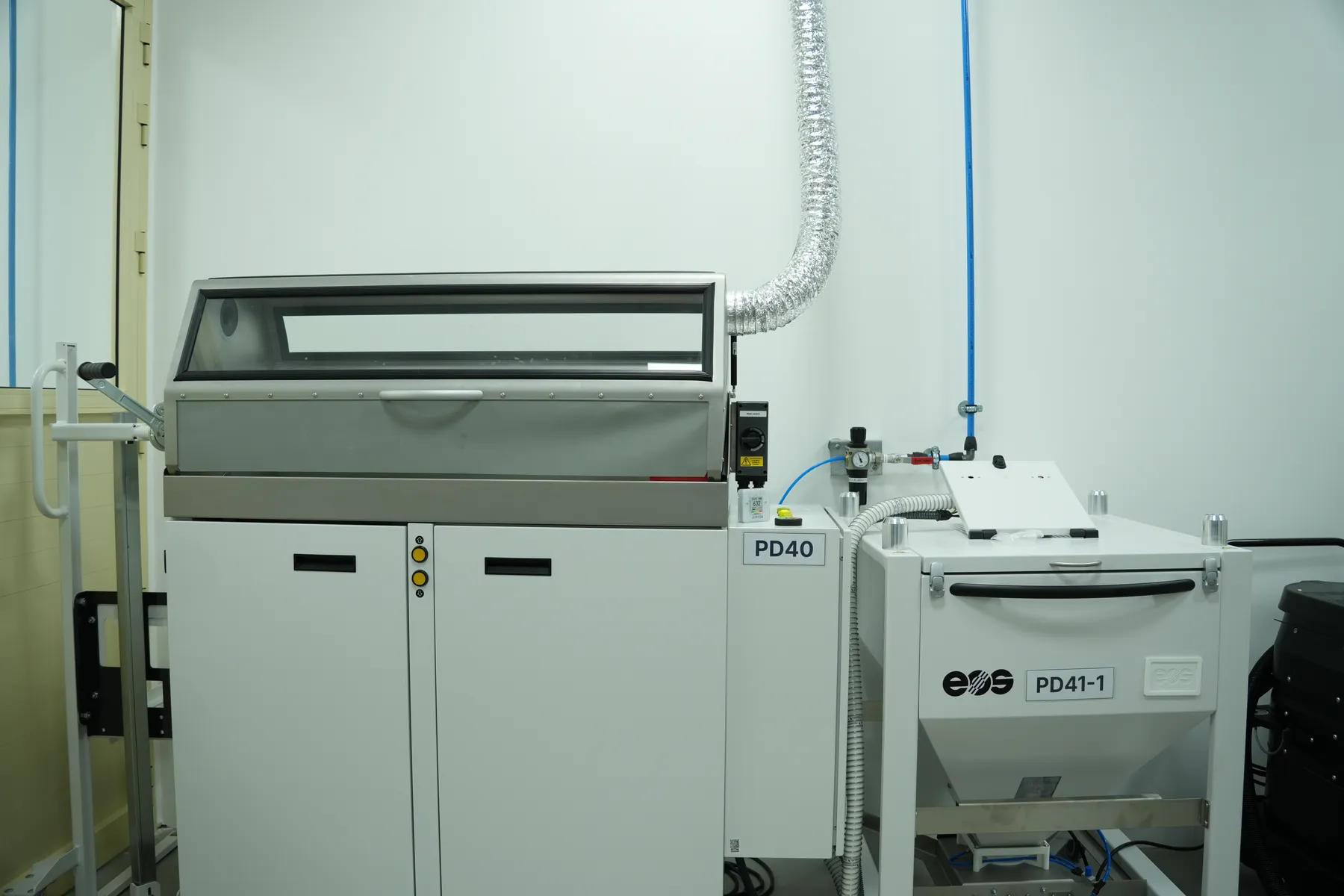 EOS SLS system and powder station on the Paradigm 3D floor